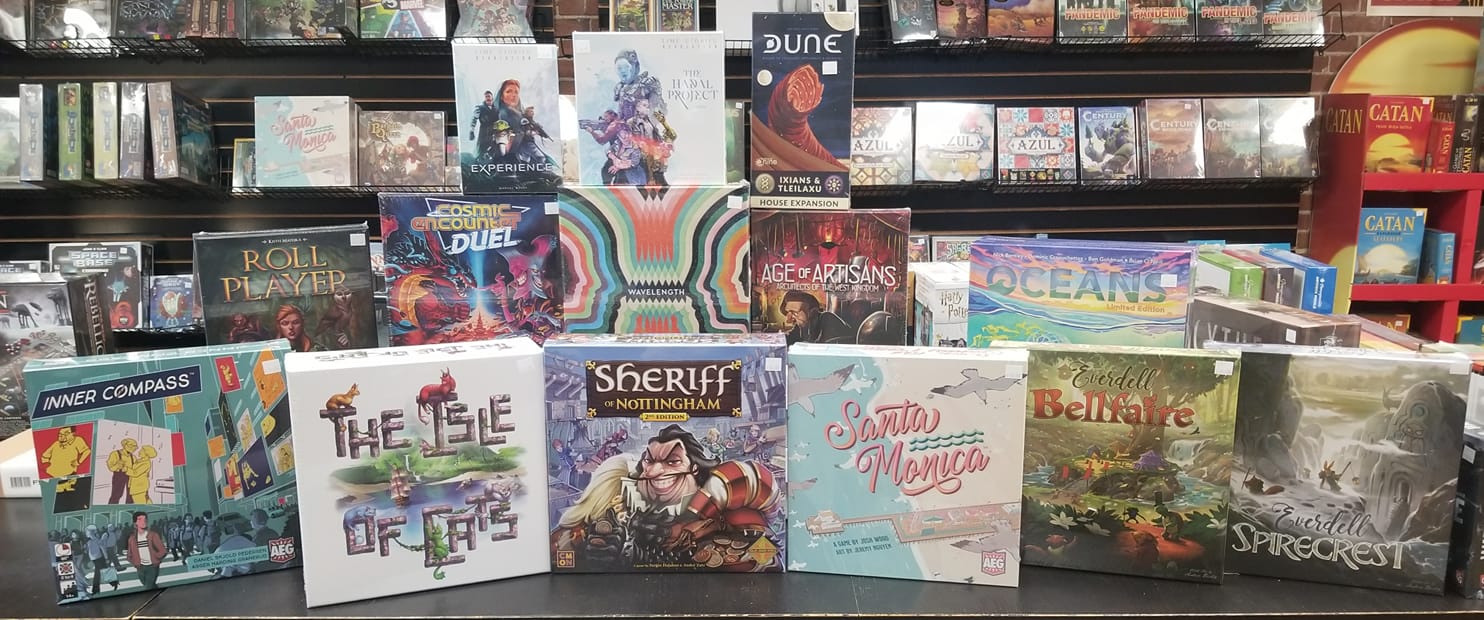 A variety of board games are displayed on a table at Titan Games in Champaign. Photo from the Titan Games Facebook page.