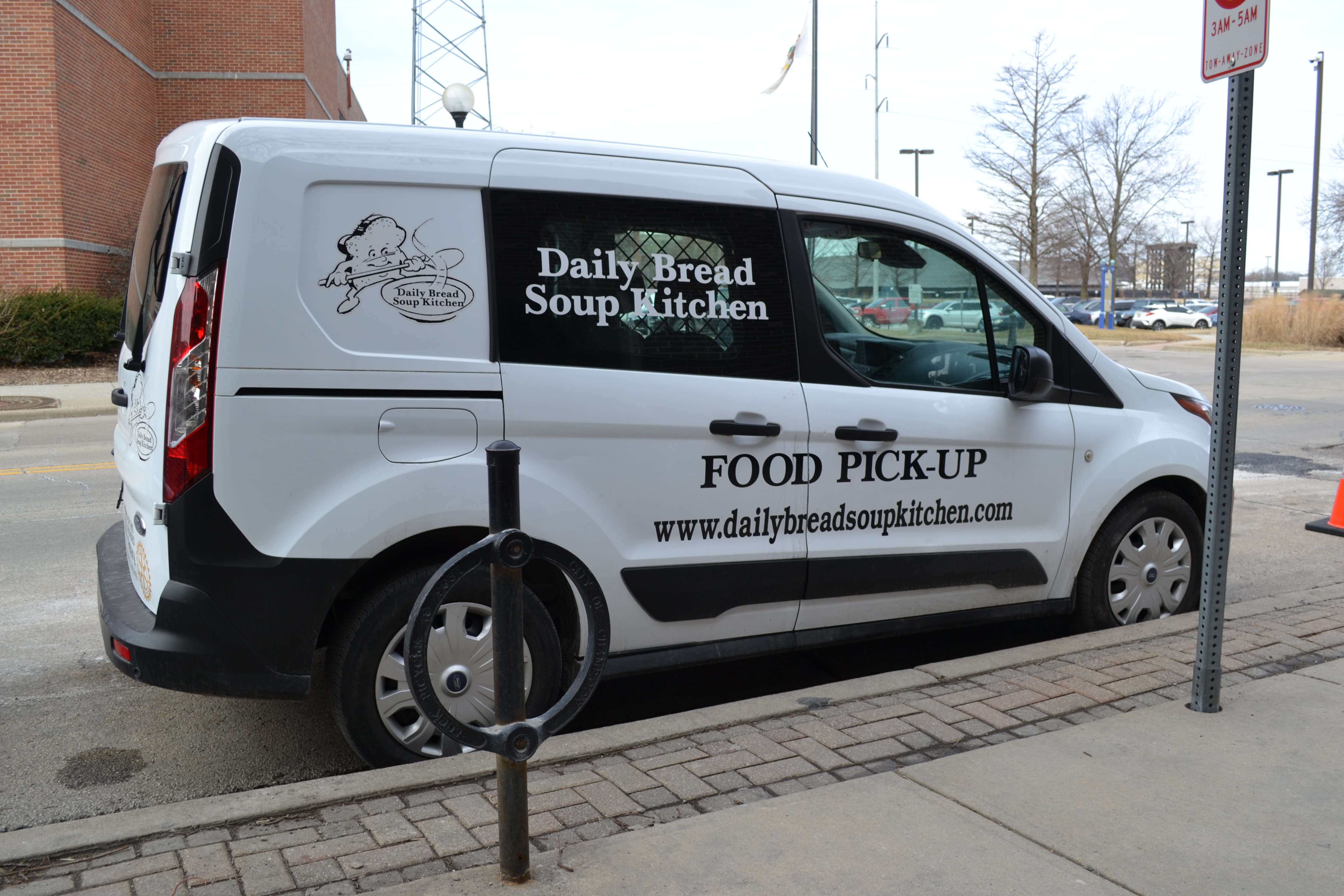 Outside of the Daily Bread Soup Kitchen, there is a van with the organization's name on the side. Photo by Alyssa Buckley.