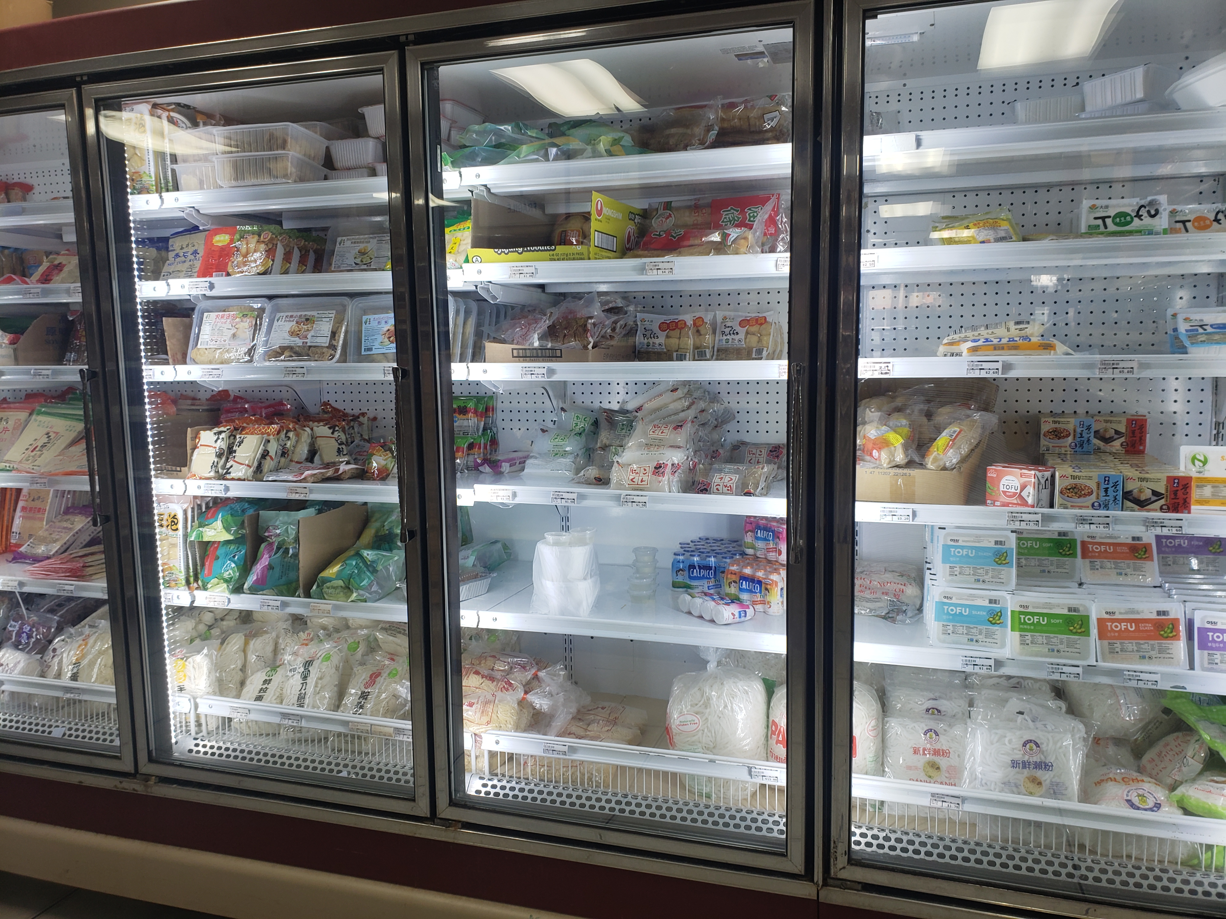 The freezers are mostly full at Asian Supermarket. Photo by Elisabeth Paulus.