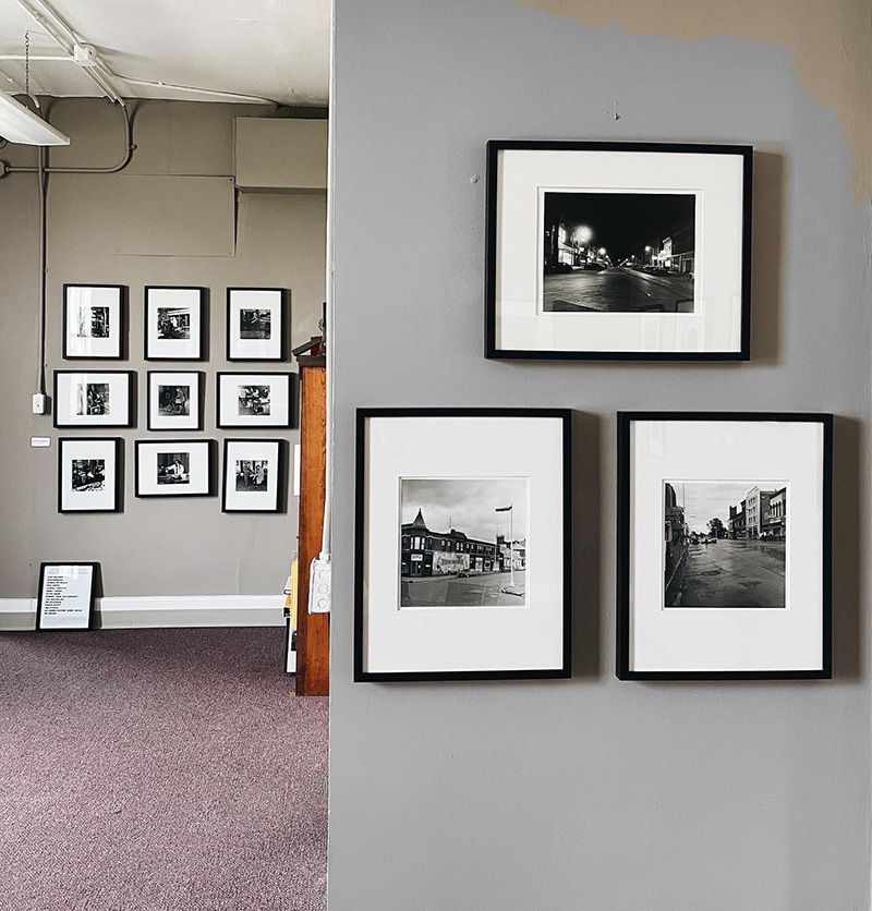 Photos on the wall of the Urbana Museum of Photography.