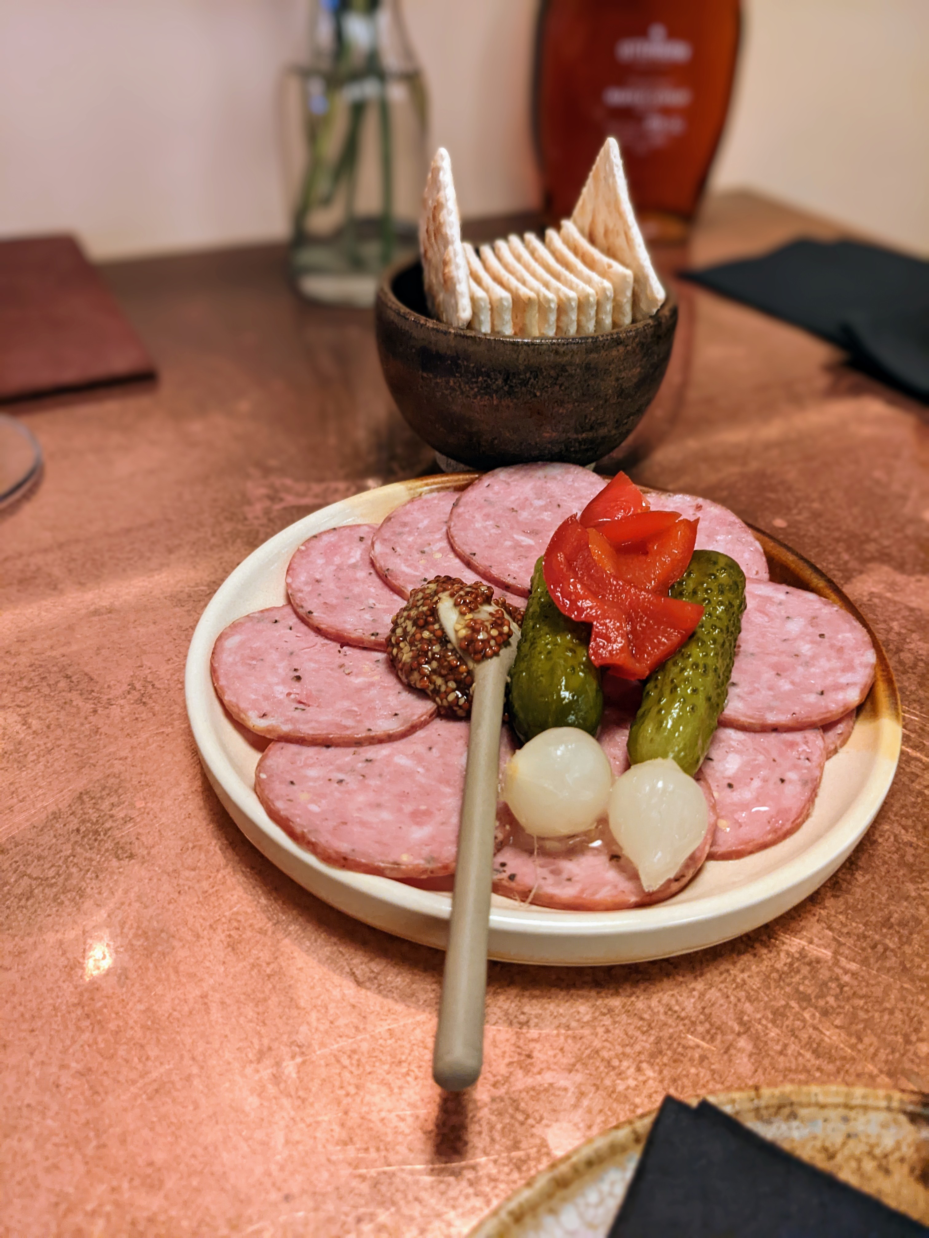 Summer sausage plate with grainy mustard and pickles. Photo by Caitlin Aylmer
