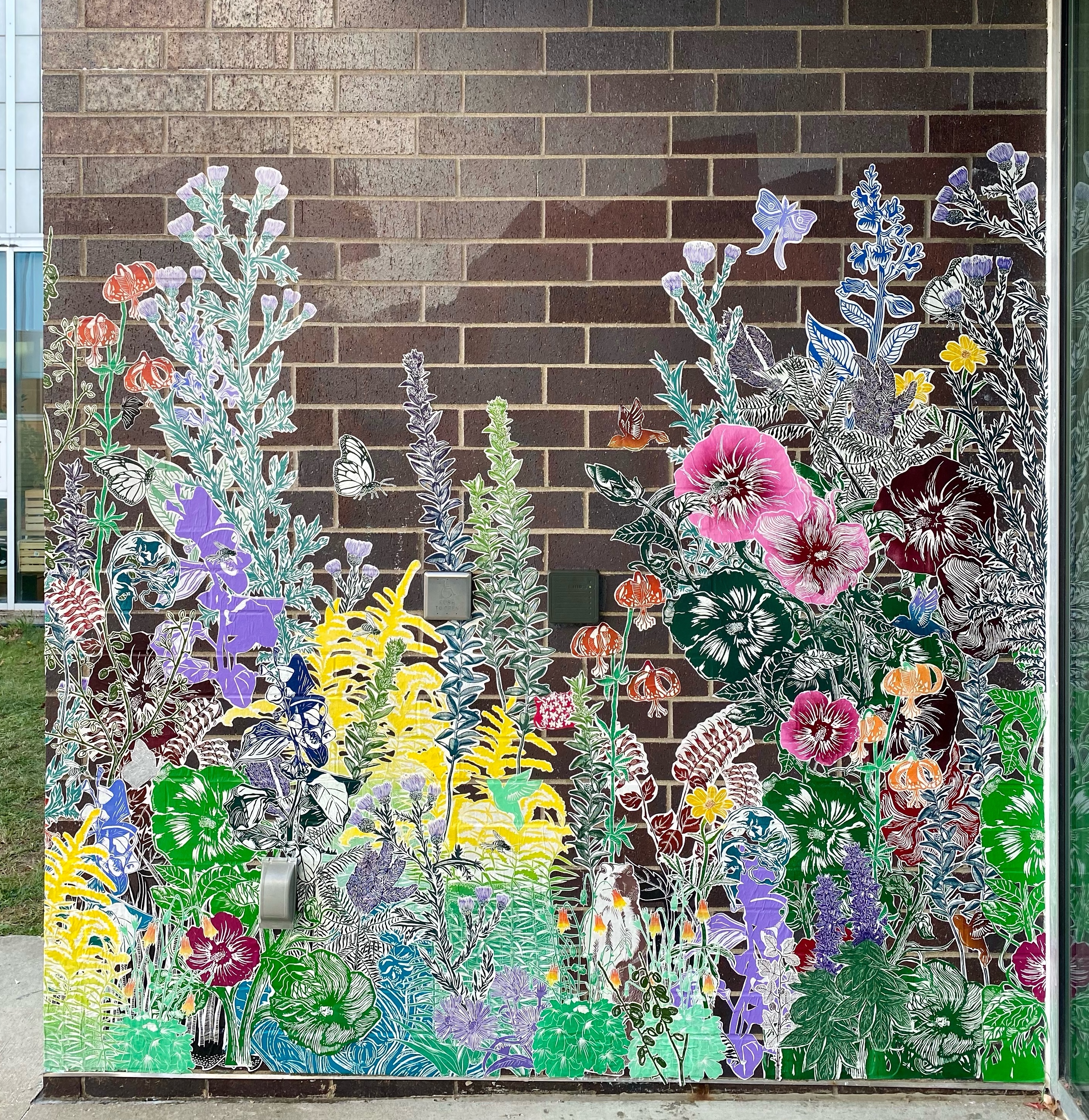 Look at this beautiful paste-up mural U of I art students made